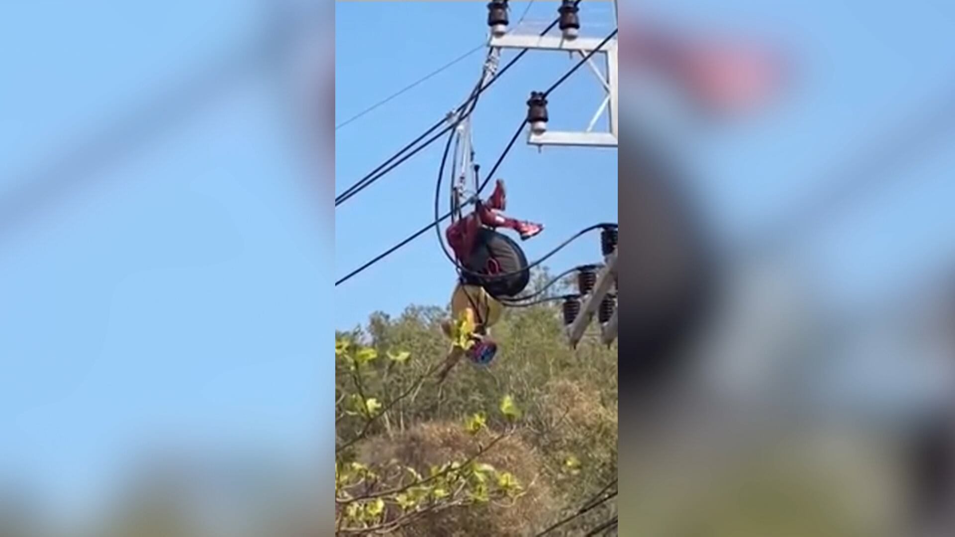 Bombeiros precisam cortar energia para regatar homem preso em fiação após cair de parapente