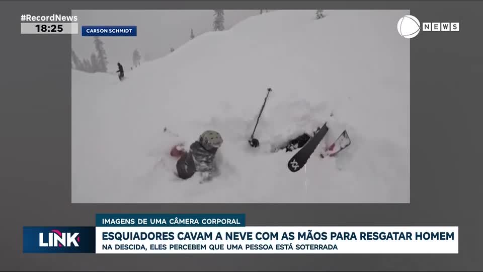 Esquiadores cavam a neve com as mãos para resgatar homem