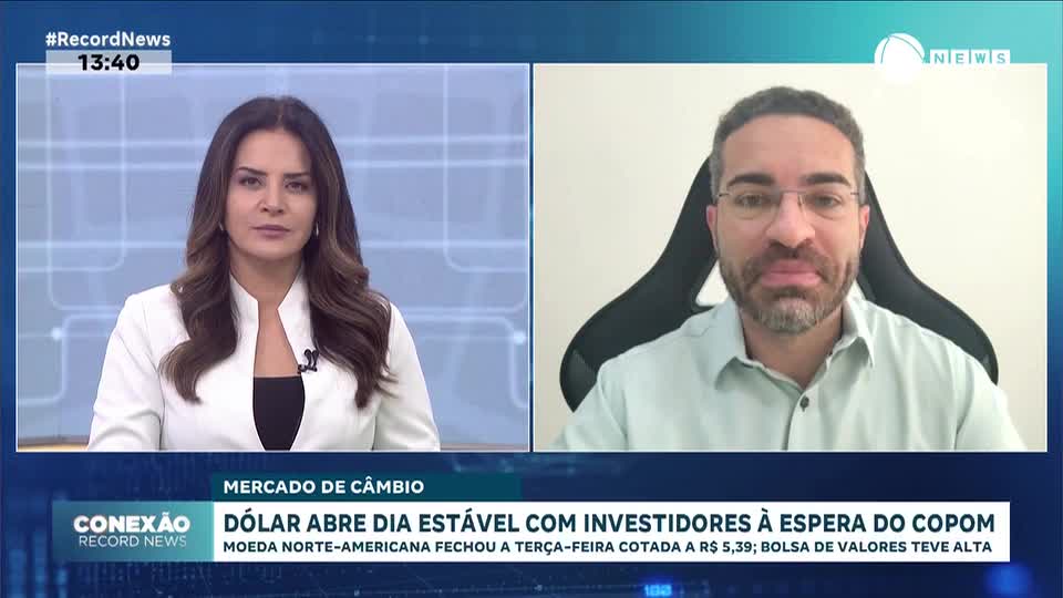 Dólar abre dia estável à espera do Copom
